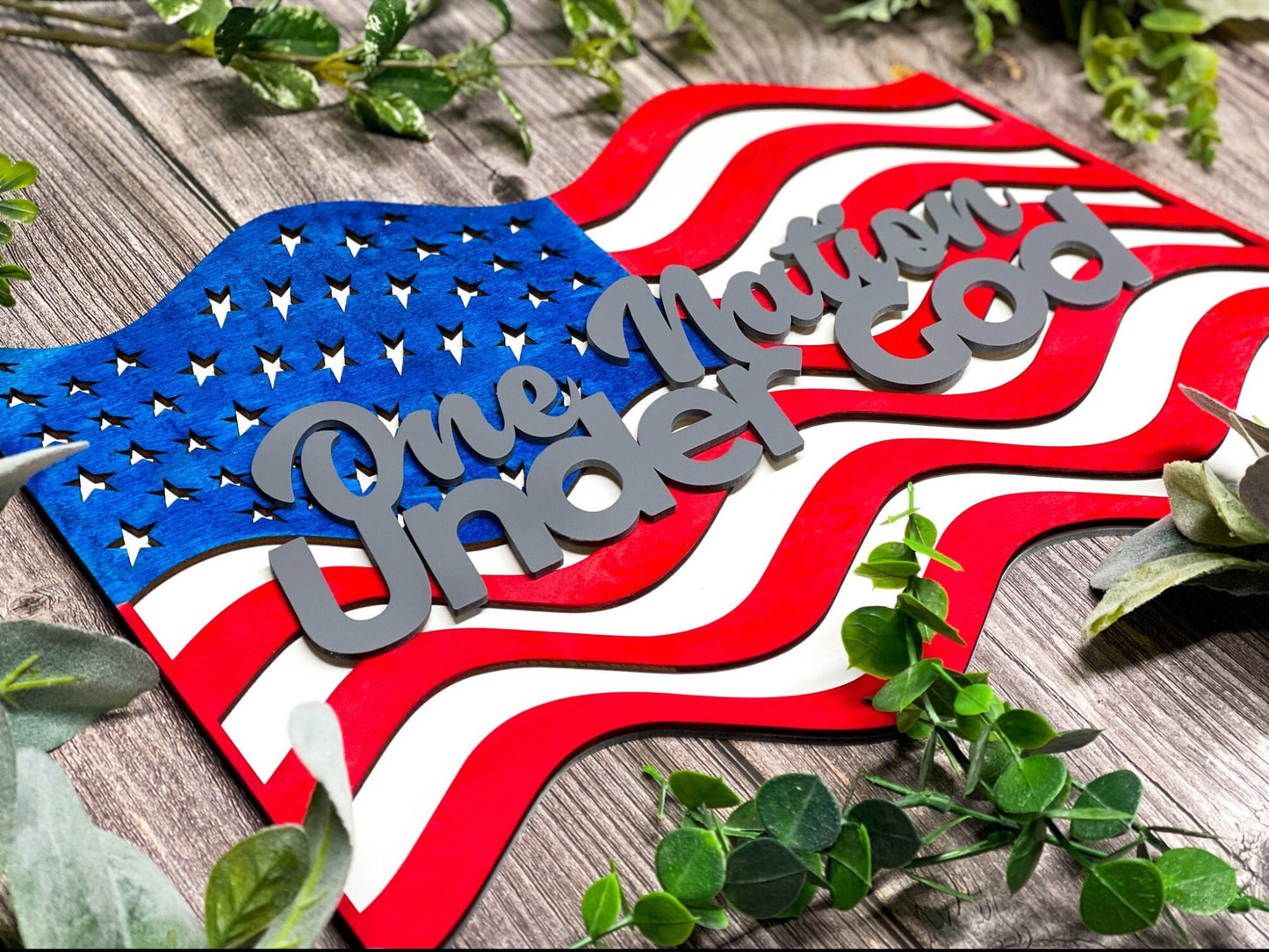 9 Variations of our Laser Engraved Patriotic Door Hanger, Door Sign for the 4th of July featuring Red White and Blue Holiday Signage